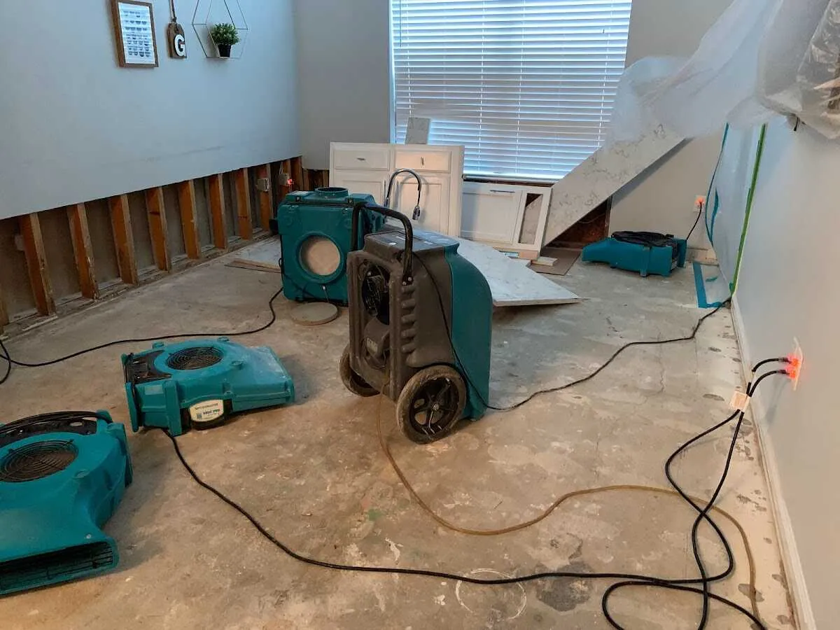 Dehumidifier in flood-cut room for Water Damage Restoration in Grenada